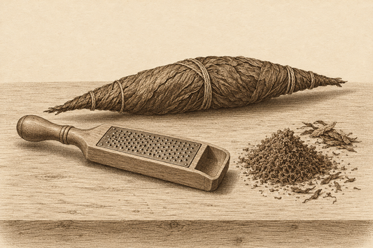 Engraving-style illustration of a twisted roll of tobacco leaf, a wooden hand rasp and a small heap of freshly grated snuff.