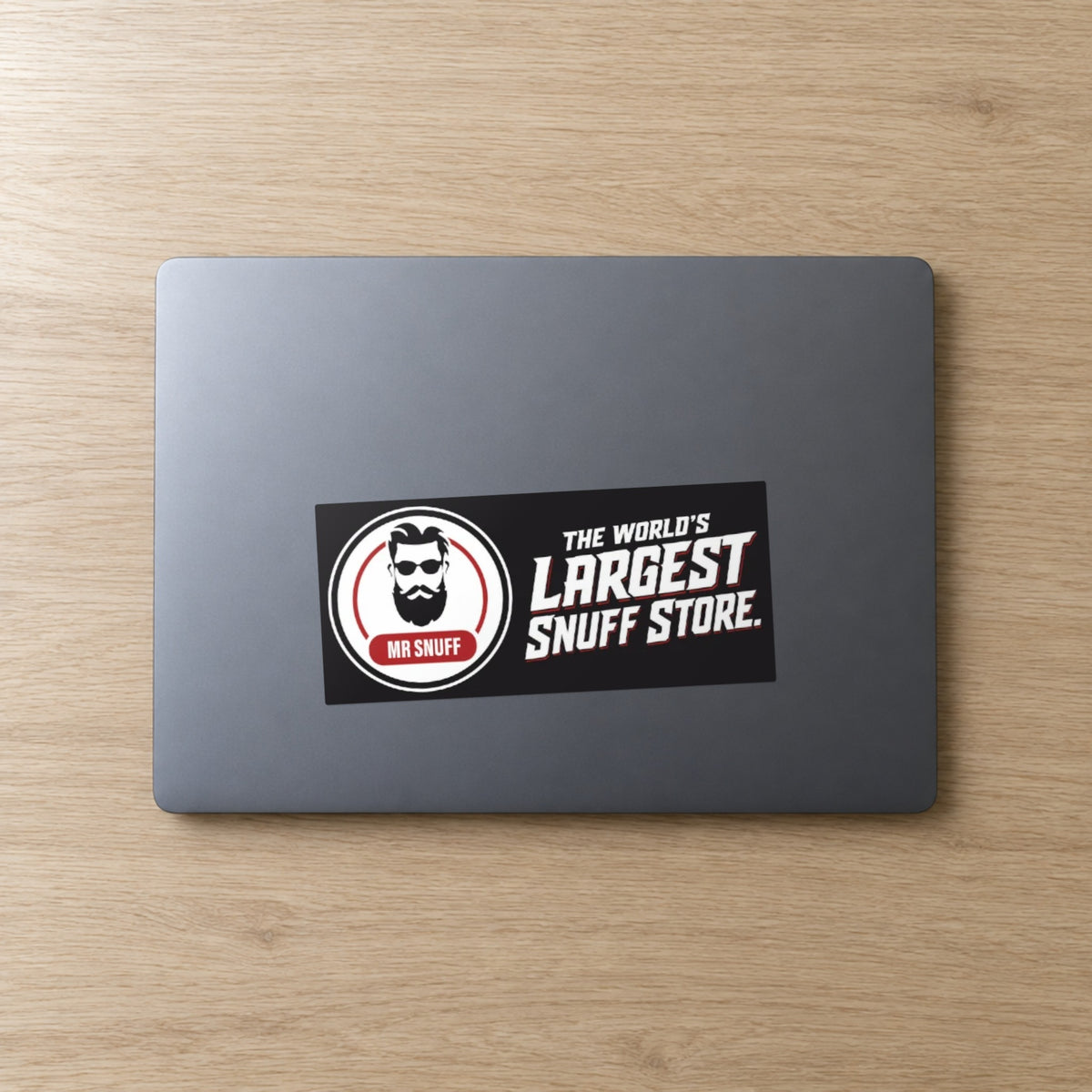 Mr Snuff Poster bumper sticker, 180 x 80 mm, on a laptop lid